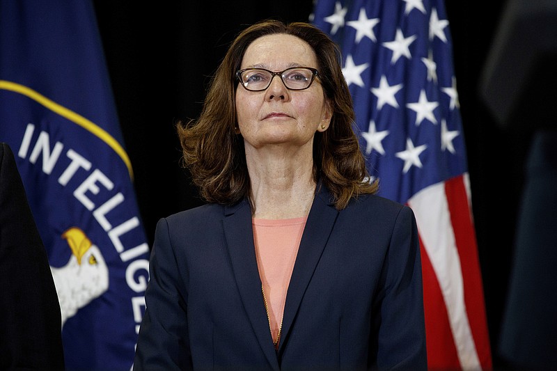 FILE - This May 21, 2018 file photo shows incoming Central Intelligence Agency director Gina Haspel at the agency's headquarters in Langley, Va. The CIA is looking for spies from all backgrounds and walks of life. Striving to further diversify its ranks, the nation's premier intelligence agency launched a new website Monday to find top-tier candidates who will bring a broader range of life experiences.  (AP Photo/Evan Vucci)