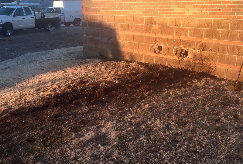 Graham Thomas/Herald-Leader
A pickup truck hit the Siloam Springs Intermediate School gym during the early hours of Tuesday morning.