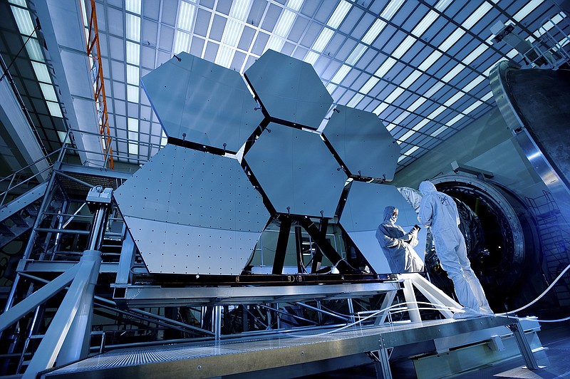 One of the mirrors of the James Webb Space Telescope array at the X-ray and cryogenic facility of the Marshall Space Flight Center in Huntsville, Ala. (MSPC/NASA via The New York Times)