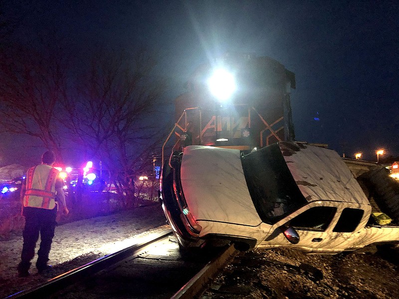 Emergency personnel from Avoca, Northeast Benton County and Rogers were dispatched to a truck vs. train collision about 5:30 p.m. Tuesday, Jan. 5, 2021. The driver of the truck did get out and was transported by ambulance to an area hospital. Evie Comfort of Garfield was on the scene and said the driver was her husband, Mark Coover, and she was driving by when her daughter saw the truck and her dad. Benton County Sheriff's deputies and Avoca firefighters remained on the scene waiting for railroad police.
