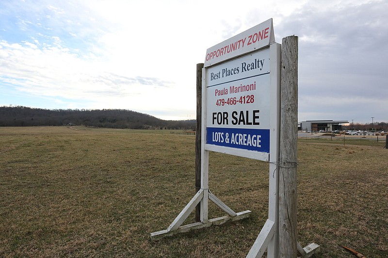 The Marinoni family farm is visible Dec. 28 near the intersection of Marinoni Drive and McMillan Drive off of Wedington Drive in Fayetteville. The City Council approved rezoning the more than 100-acre property by a 5-3 vote Tuesday. (File photo/NWA Democrat-Gazette/David Gottschalk)