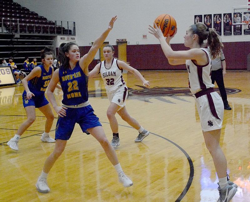 Graham Thomas/Siloam Sunday
Siloam Springs senior Sydney Moorman squares up a 3-point shot in front of the Siloam Springs bench during Friday's game at Panther Activity Center. Moorman hit four 3-pointers and led the Lady Panthers with 17 points in a 57-31 win over Mountain Home.