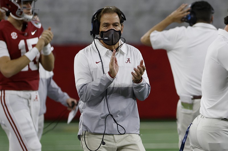 Alabama head coach Nick Saban applauds as he watches his team play Notre Dame late in the second half of the Rose Bowl in Arlington, Texas on Jan. 1. - Photo by Ron Jenkins of The Associated Press