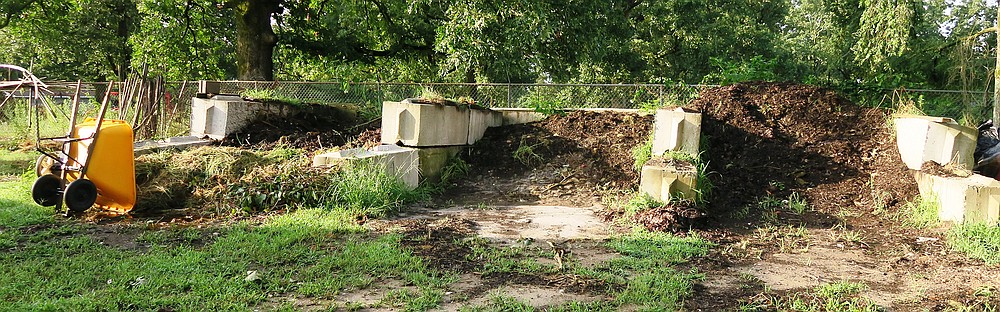 For large gardens, composting bins for different stages of decomposition make sense. This setup binds allowed Zion Evangelical Lutheran Church's community garden at Avilla in Saline County to make helpful amendments to native soil. (Special to the Democrat-Gazette/Janet B. Carson)