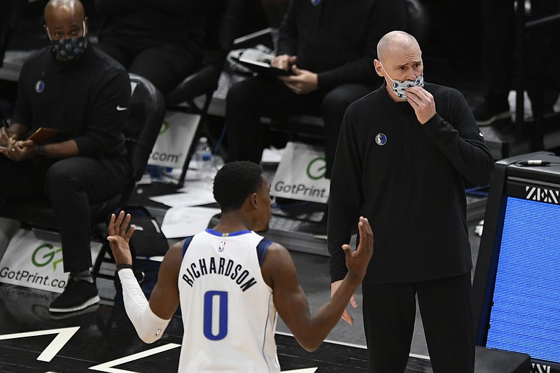 Dallas Mavericks head coach Rick Carlisle and Josh Richardson (0) argue with referees after Richardson was called for a foul during the second half of an NBA basketball game against the Chicago Bulls, Sunday, Jan. 3, 2021, in Chicago. (AP Photo/Paul Beaty) story.lead_photo.caption