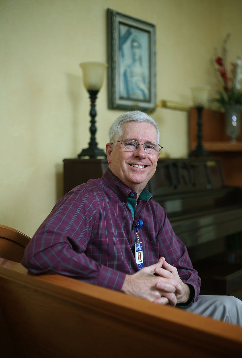 Chaplain Jim Moore sits Thursday, October 29, 2020, in the chapel at Circle of Life Hospice in Springdale. Check out nwaonline.com/201108Daily/ and nwadg.com/photos for a photo gallery.(NWA Democrat-Gazette/David Gottschalk)