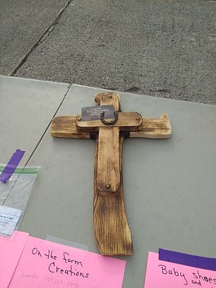 Courtesy Photo Those who came to the bake sale and silent auction on Sunday in Noel had a chance to bid on several items, such as this cross. Funds went to help the families of two heroes that helped during a recent fire.