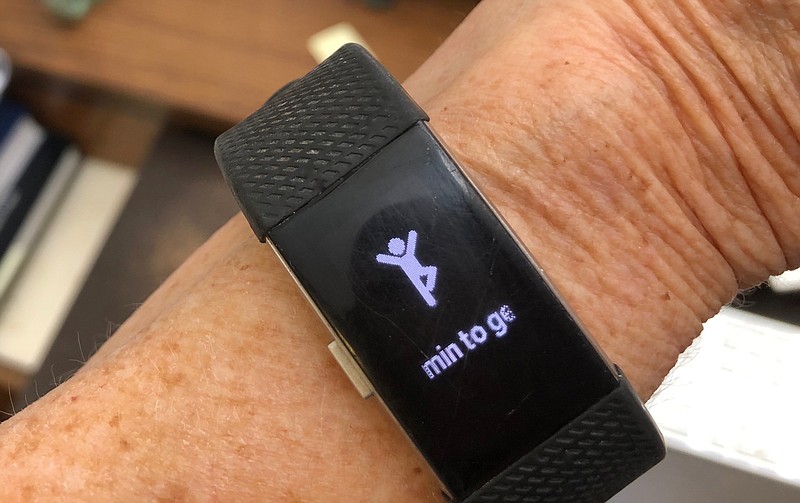 A fitness watch reminds its wearer to get up and move around. (Arkansas Democrat-Gazette/Celia Storey)