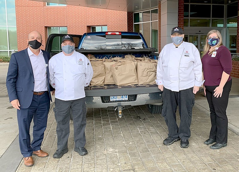 Photo submitted
Cherokee Casino in West Siloam Springs, Okla., donated 150 meals for Siloam Springs Regional Hospital employees on Jan. 8. Hospital CEO Adam Bracks and CFO Carrie Cornett were on hand to receive the food and express their appreciation on behalf of the hospital.