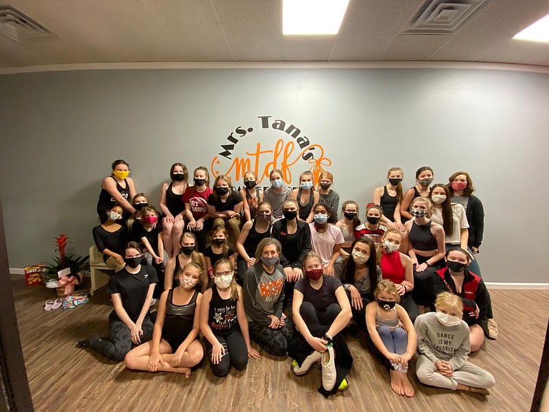 Tana Cook, third from left on front row, is surrounded by some of her students in her studio, Mrs. Tana's Dance Factory, 8404 Dollarway Road. She opened the new location Jan. 4. (Special to The Commercial) story.lead_photo.caption