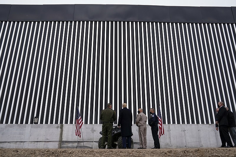 President Donald Trump tours a section of the U.S.-Mexico border wall under construction Tuesday, Jan. 12, 2021, in Alamo, Texas. (AP Photo/Alex Brandon)