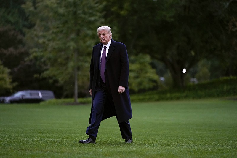President Donald Trump walks from Marine One to the White House in Washington on Oct. 1 as he returns from Bedminster, N.J. - Photo by Carolyn Kaster of The Associated Press story.lead_photo.caption