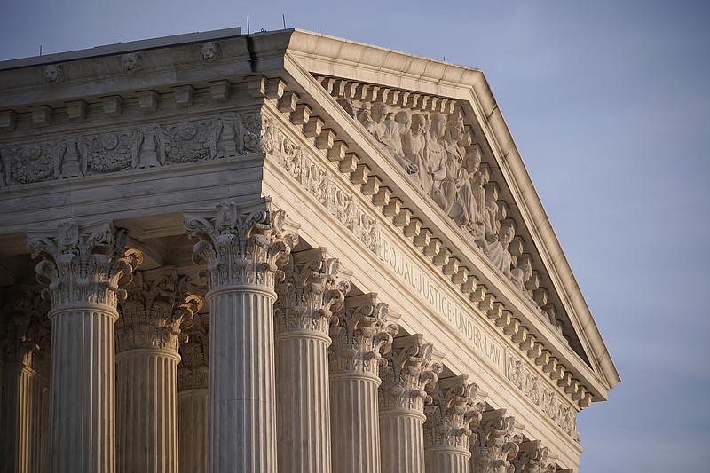 FILE - In this Nov. 5, 2020, file photo the Supreme Court is seen in Washington. The Supreme Court has ordered that women must visit a doctor's office, hospital or clinic in person to obtain an abortion pill during the COVID-19 pandemic, though similar rules for other drugs have been suspended during the public health emergency. (AP Photo/J. Scott Applewhite, File) story.lead_photo.caption