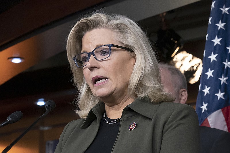 FILE - In this Dec. 17, 2019 file photo, Rep. Liz Cheney, R-Wyo., speaks with reporters at the Capitol in Washington. A deepening divide among Republicans over President Donald Trump's efforts to overturn the election runs prominently through Wyoming, the state that delivered Trump's widest prevailing margin by far. Eleven Republican senators saying they will not be voting Wednesday, Jan. 6, 2021, to confirm President-elect Joe Biden's victory include Wyoming's newly sworn in Sen. Cynthia Lummis, a Cheyenne-area rancher and former congresswoman. Vocal opponents of any such move include Wyoming Rep. Liz Cheney, leader of GOP messaging in the House as its third-ranking Republican (AP Photo/J. Scott Applewhite, File)