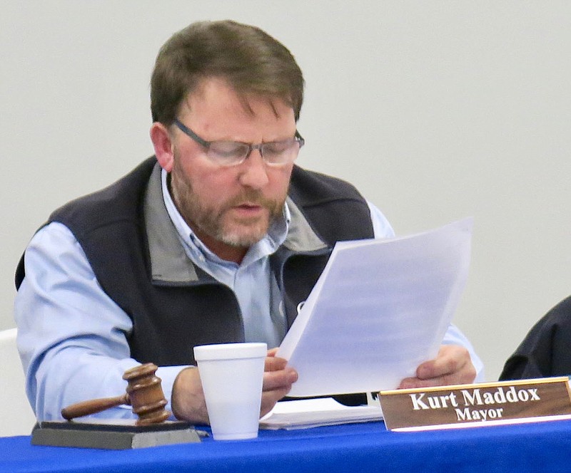 Westside Eagle Observer/SUSAN HOLLAND
Gravette mayor Kurt Maddox reads his annual State of the City address to members of the Gravette city council at their regular meeting Thursday evening, Jan. 14.