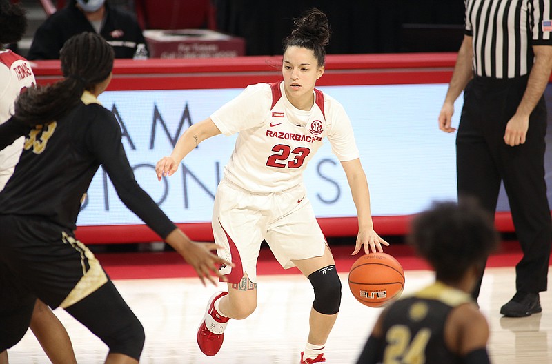 Arkansas' Amber Ramirez drives into the lane during a Dec. 21, 2020, game against the University of Arkansas at Pine Bluff Golden Lions at Bud Walton Arena. Coach Mike Neighbors said that it would be a game-time decision on whether Ramirez would play tonight. - Photo by David Gottschalk of NWA Democrat-Gazette