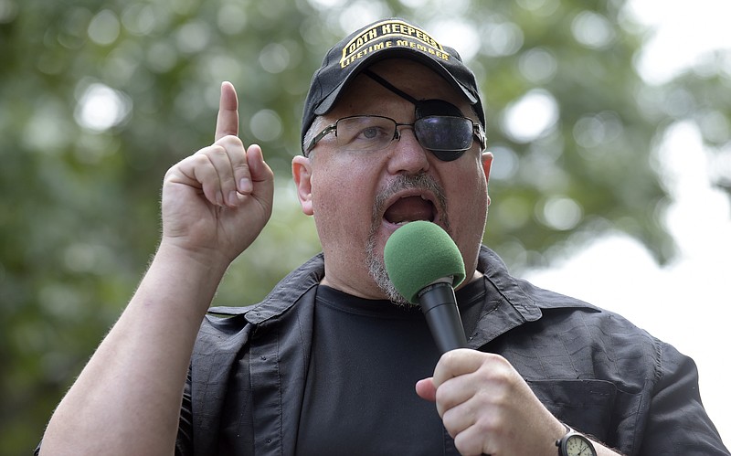 FILE - In this Sunday, June 25, 2017 file photo, Stewart Rhodes, founder of the citizen militia group known as the Oath Keepers speaks during a rally outside the White House in Washington. Rhodes, an Army veteran who founded the Oath Keepers in 2009 as a reaction to the presidency or Barack Obama, had been saying for weeks before the Jan. 6, 2021 Capitol riot that his group was preparing for a civil war and was "armed, prepared to go in if the president calls us up." (AP Photo/Susan Walsh, File)