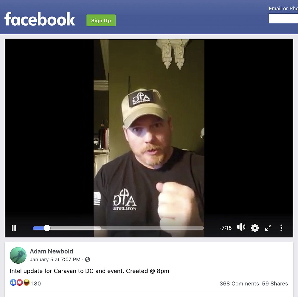 This image shows a video by Adam Newbold posted on Facebook on Tuesday, Jan. 5, 2021. The retired U.S. Navy SEAL said he was not going to Washington, D.C., "looking for a fight" and that people should treat police officers and National Guard members with respect. He added: "We are not going down looking for a fight. We are just very prepared, very capable, and very skilled patriots ready for a fight. And we will react without hesitation when called upon to do so." (Facebook via AP)