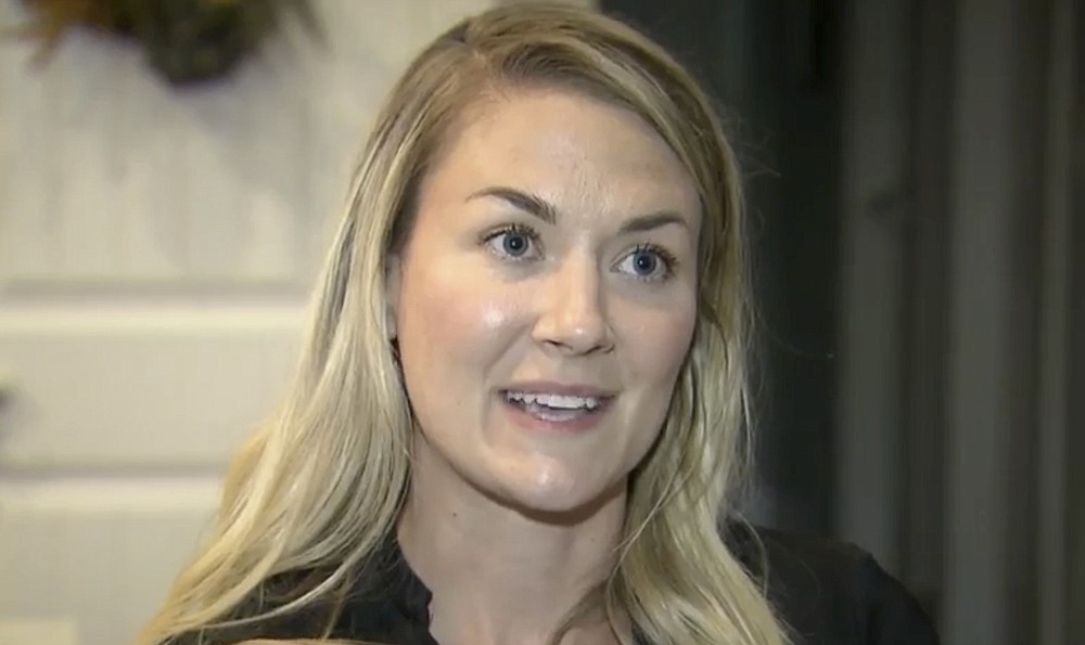 FILE - In this image taken from video provided by WRAL-TV, Capt. Emily Rainey speaks during an interview with WRAL-TV, in Southern Pines, N.C., in May 2020. The Army is investigating Rainey, a psychological operations officer, who led a group of people from North Carolina to the rally in Washington that led to the deadly riot in the U.S. Capitol by supporters of President Donald Trump. (Courtesy of WRAL-TV via AP, File)