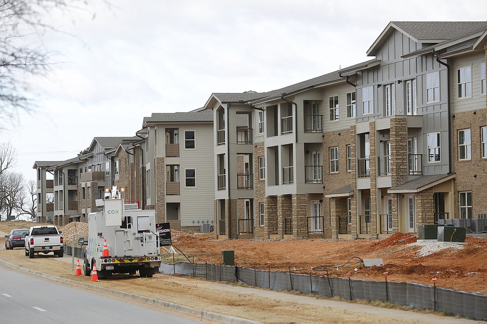The construction of a 468-unit apartment community is visible Thursday, January 14, 2021, near Arvest Ballpark in Springdale. The apartments are called the Trails at the Crossings. Check out nwaonline.com/210117Daily/ and nwadg.com/photos for a photo gallery.
(NWA Democrat-Gazette/David Gottschalk)