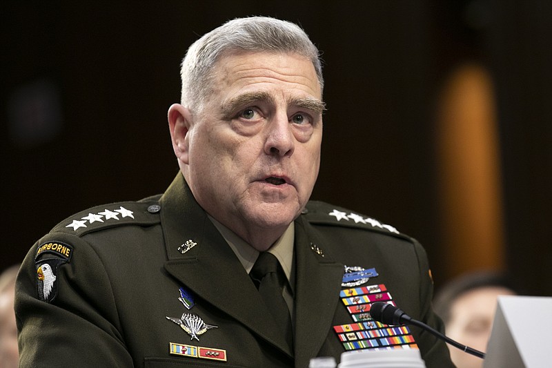 FILE - In this March 4, 2020, file photo Chairman of the Joint Chiefs of Staff Gen. Mark Milley testifies to Senate Armed Services Committee about the budget on Capitol Hill in Washington. President-elect Joe Biden will inherit Milley as his senior military adviser, and although Biden could replace him, he likely won't. (AP Photo/Jacquelyn Martin, File)