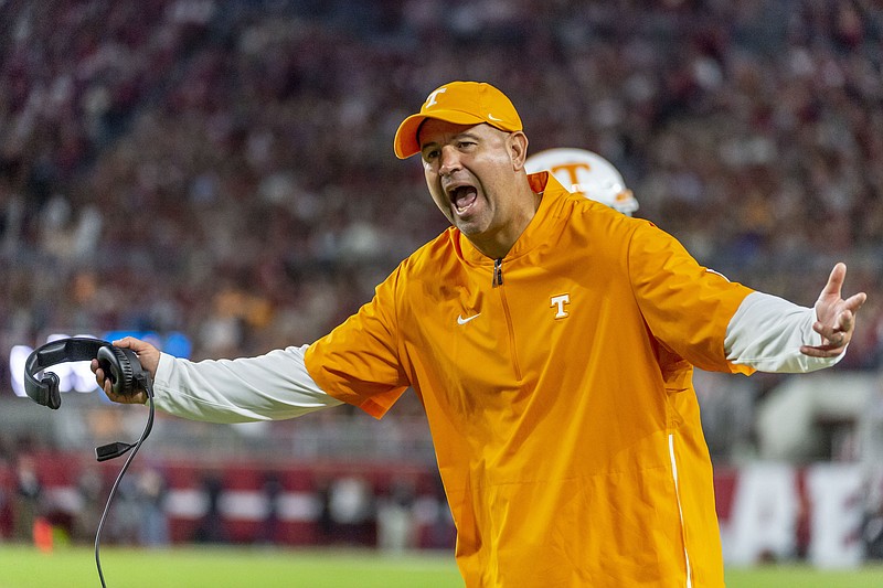 FILE - In this Oct. 19, 2019, file photo, Tennessee head coach Jeremy Pruitt yells at the officials during an NCAA college football game against Alabama in Tuscaloosa, Ala. Tennessee fired Pruitt Monday, Jan. 18, 2021. (AP Photo/Vasha Hunt, File)