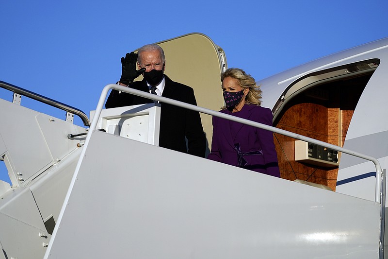 President-elect Joe Biden and his wife Jill Biden arrive at Andrews Air Force Base, Tuesday, Jan. 19, 2021, in Andrews Air Force Base, Md. (AP Photo/Evan Vucci)
