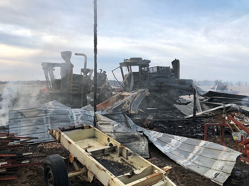 A fire at a University of Arkansas agicultural center caused an estimated $1 million worth of damage, destroying a storage facility and equipment, according to a news release. (Courtesy photo/University of Arkansas)