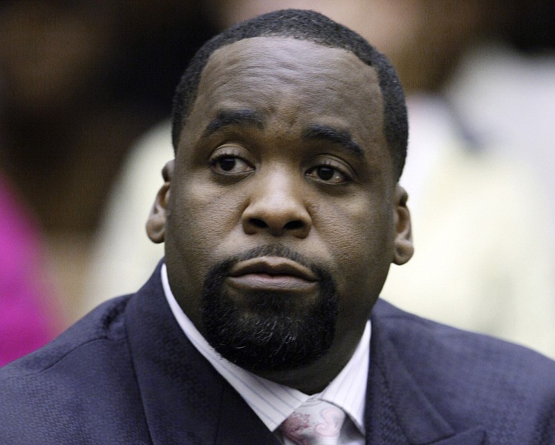 In this May 25, 2010 file photo, former Detroit Mayor Kwame Kilpatrick sits in a Detroit courtroom. President Donald Trump commuted the prison sentence of Kilpatrick, who has served about seven years of a 28-year sentence for corruption. The announcement Wednesday morning, Jan. 20, 2021, was part of a flurry of clemency action in the final hours of Trump’s White House term. CORRECTION: An earlier version of this photo included an incorrect title for Trump. (AP Photo/Paul Sancya, File)