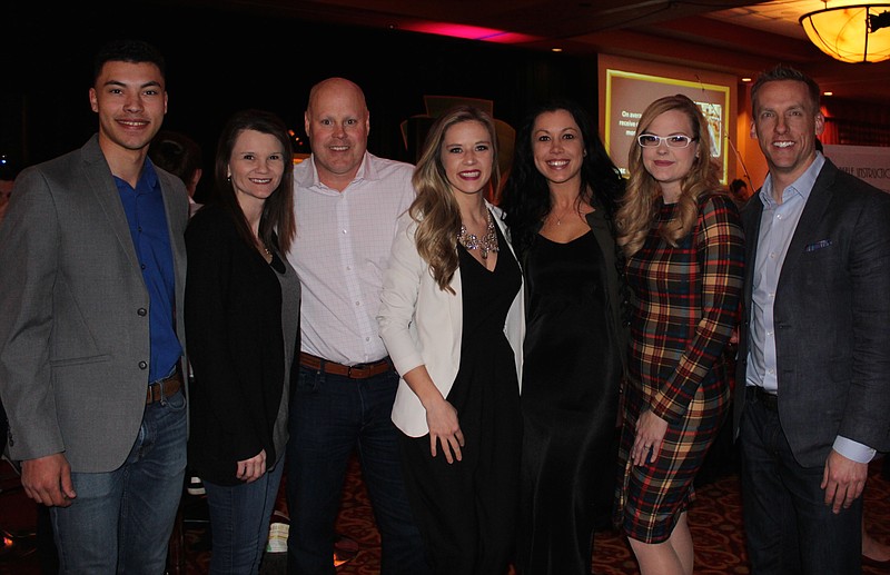 NWA Democrat-Gazette/CARIN SCHOPPMEYER Alex Wegner (from left), Teresa and Brent Spencer, Samantha Bigham, Lauren Nelson, Molly Boyd and Lane Florquist gather for a photo at All In.