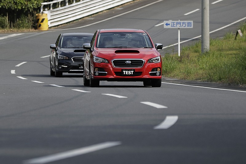 Prototype Subaru Levorg vehicles equipped with the company's EyeSight driving support system are driven during a test drive in 2017. MUST CREDIT: Bloomberg photo by Kiyoshi Ota