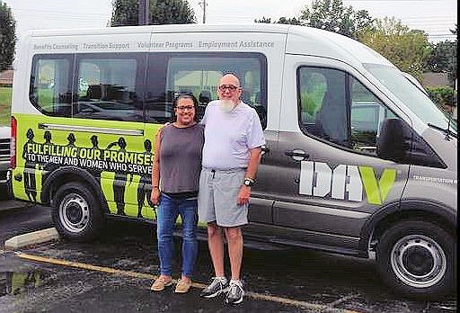 From left, Breanna Wilson, voluntary service specialist, with driver Mac McEntire at the Disabled American Veterans National Headquarters at Cold Springs, Ky., picking up a van donated by the Pine Bluff DAV for the Pine Bluff Volunteer Transportation Route. (Special to The Commercial/Michael Dobbs)