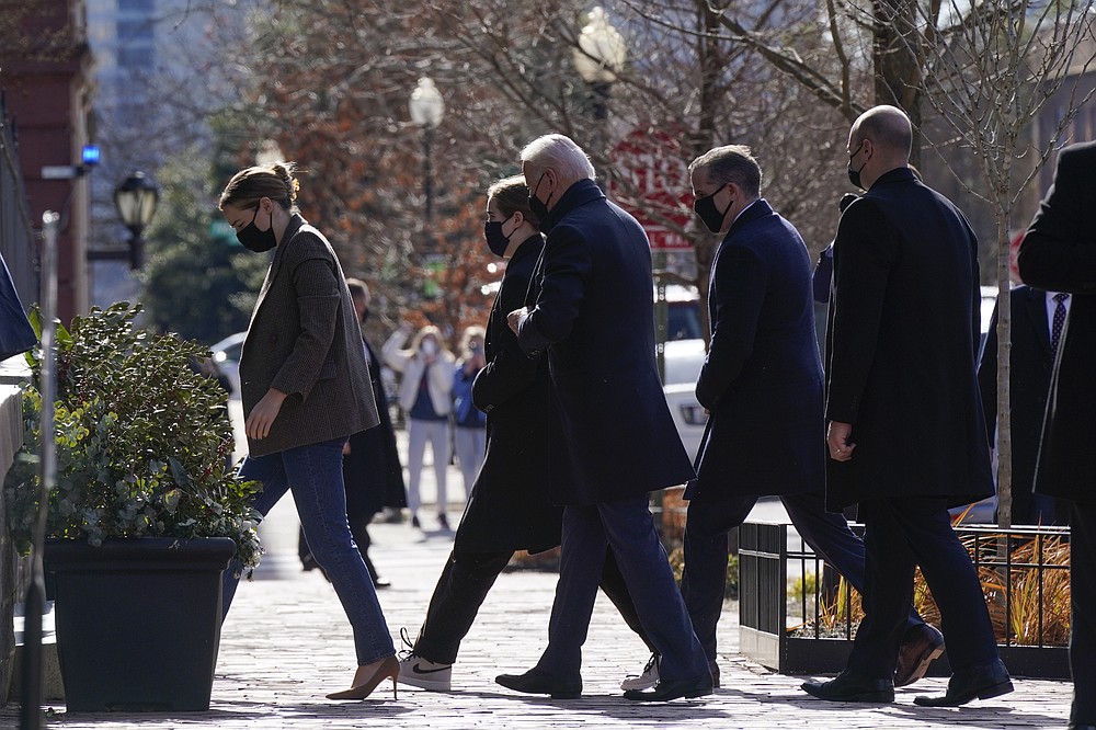 President Joe Biden arrives to attend Mass at Holy Trinity Catholic Church, Sunday, Jan. 24, 2021, in the Georgetown neighborhood of Washington. (AP Photo/Patrick Semansky)