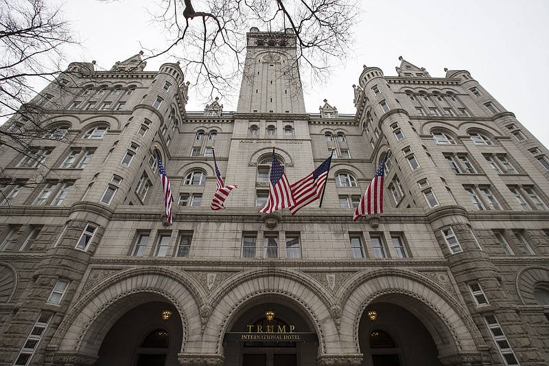 FILE - In this Jan. 4, 2019 file photo, the Trump International Hotel, is shown in Washington. A federal appeals court has revived a lawsuit accusing President Donald Trump of illegally profiting off the presidency through his luxury Washington hotel. The lawsuit brought by the state of Maryland and the District of Columbia claims Trump has violated the emoluments clause of the Constitution by accepting profits through foreign and domestic officials who stay at the Trump International Hotel.  (AP Photo/Alex Brandon, File)