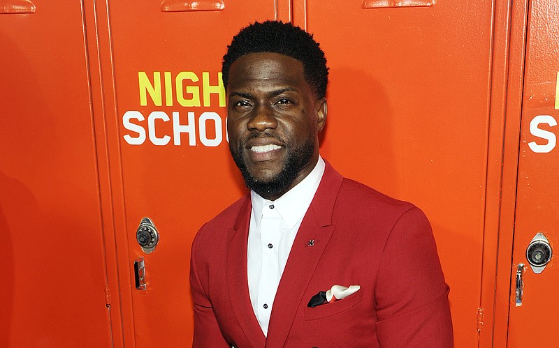 FILE - Kevin Hart, a cast member, producer and co-writer of "Night School," poses at the premiere of the film Sept. 24, 2018, in Los Angeles. Hart will debut his new SiriusXM original podcast with Jerry Seinfeld as the series' inaugural guest. The satellite radio company announced Wednesday, Jan. 27, 2021, the launch of Hart's "Inside Jokes with Kevin Hart." (Photo by Chris Pizzello/Invision/AP, File)