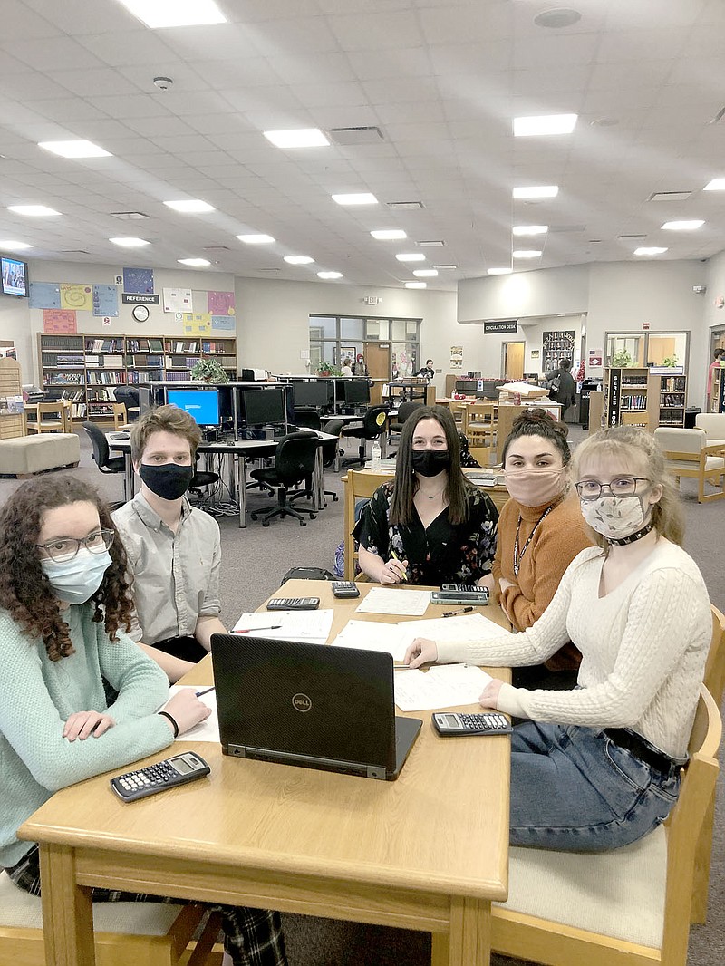 COURTESY PHOTO
This year's Academic Competition in Education season is being held virtually through the Zoom video app. Prairie Grove High School's team includes Olivia Thompson, Sawyer Myane, Ella Nations, Landin Madewell and Emma Hannah. They were in the school library for their virtual match against Farmington last week. Other team members are Jeryn Carter and Millie Whitney.