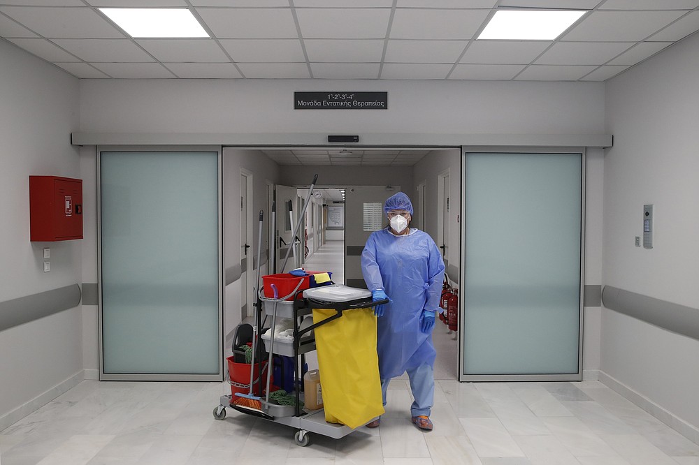 Unnoticed, cleaners do vital work in covid ICUs