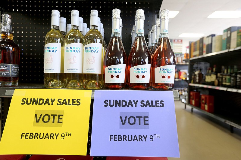 Signage was posted, prior to the election, inside C and J Liquor, located at 129 Fowler St., Suite A, in Gentry. A special election on Feb. 9 determined whether to authorize the sale of alcoholic beverages for off-premises consumption on Sundays between the hours of 10 a.m. and midnight within the city of Gentry. The City Council on Sept. 8 voted to add the ballot initiative to the Nov. 3 general election following a petition by Charles and Jerah Jech to have the initiative added to the ballot. The measure was submitted too late for the Nov. 3 ballot and was moved to December. When that date would not work, the election was scheduled for Feb. 9. (NWA Democrat-Gazette/David Gottschalk)