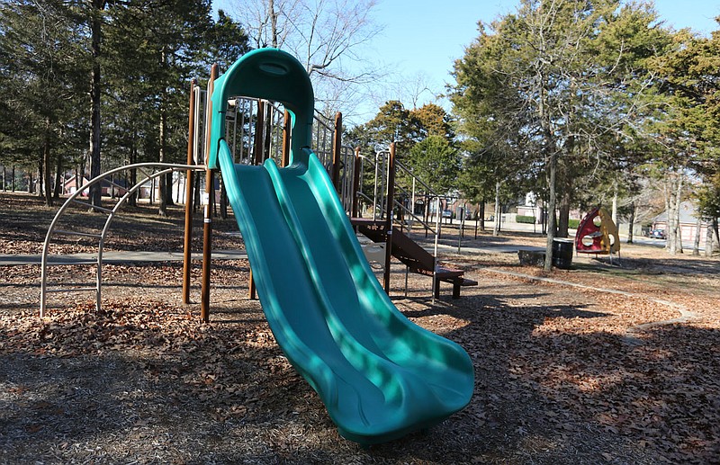 Playground equipment is seen Monday, Feb. 1, 2021, at Braden Park at 2515 N. Worthington Way in Fayetteville. The 2-acre park in the middle of Covington subdivision was acquired by the city through its parkland dedication ordinance. The city‚Äôs Parks and Recreation Advisory Board discussed the parkland dedication ordinance during its Monday meeting. Check out nwaonline.com/210202Daily/ and nwadg.com/photos for a photo gallery. (NWA Democrat-Gazette/David Gottschalk)