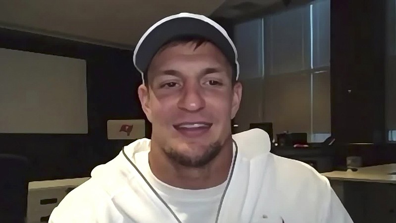 In this still image from video provided by the NFL, Tampa Bay Buccaneers tight end Rob Gronkowski speaks during Opening Night for the NFL Super Bowl 55 football game Monday, Feb. 1, 2021. (NFL via AP)