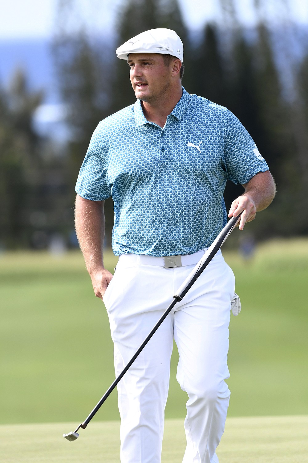 Bryson DeChambeau watches his putt on the ninth green during the third round of the Tournament of Champions golf event, Saturday, Jan. 9, 2021, at Kapalua Plantation Course in Kapalua, Hawaii. (Matthew Thayer/The Maui News via AP)