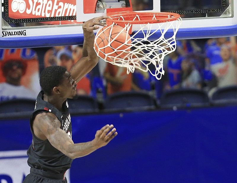 South Carolina forward Keyshawn Bryant dunks against Florida during the first half of an NCAA college basketball game Wednesday, Feb. 3, 2021, in Gainesville, Fla. (AP Photo/Matt Stamey)