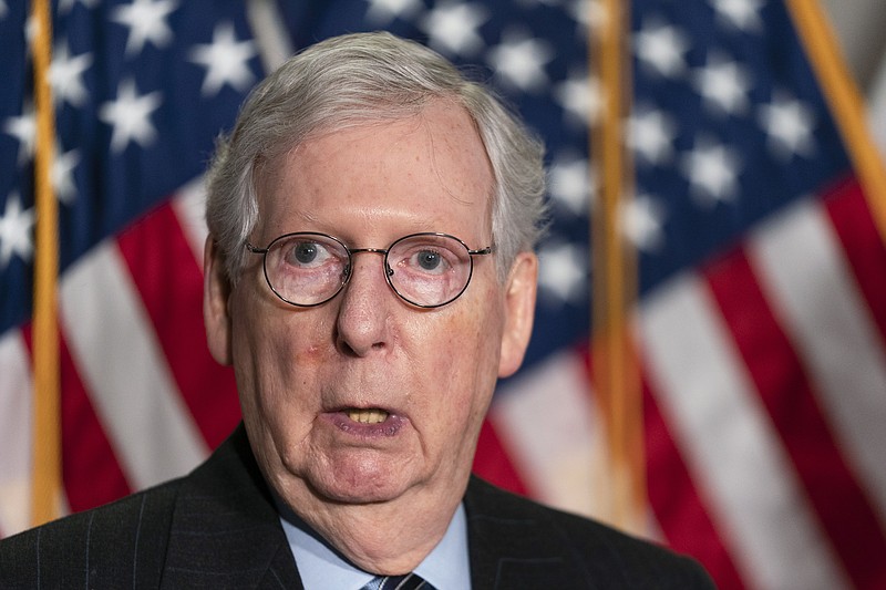 Senate Minority Leader Mitch McConnell of Ky., speaks to reporters following a Republican policy luncheon on Capitol Hill, Tuesday, Feb. 2, 2021, in Washington. (AP Photo/Manuel Balce Ceneta)