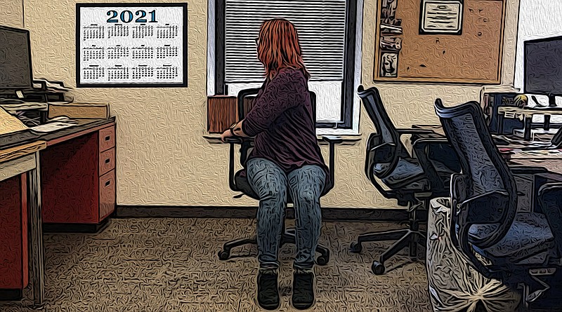 The Desk Chair Twist lets you do a bit of flexibility training at the office. (Arkansas Democrat-Gazette/Celia Storey)