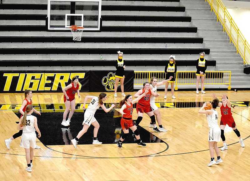 MARK HUMPHREY  ENTERPRISE-LEADER/Prairie Grove junior Trinity Dobbs gets an open look from 3-point territory. Dobbs scored 17 points in the Lady Tigers' 65-38 loss to Pea Ridge in 4A-1 Conference girls basketball action at Tiger Arena on Tuesday, Feb. 9.