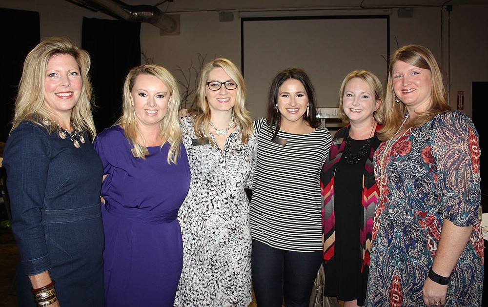 NWA Democrat-Gazette/CARIN SCHOPPMEYER Vanessa Miller (from left), Gracie Ziegler, Beth Emmanuel, Sarah White, Megan Cuddy and Misty Bolton-Samuels, members of the Junior League of Northwest Arkansas attend the Courage Award Luncheon on Oct. 14.