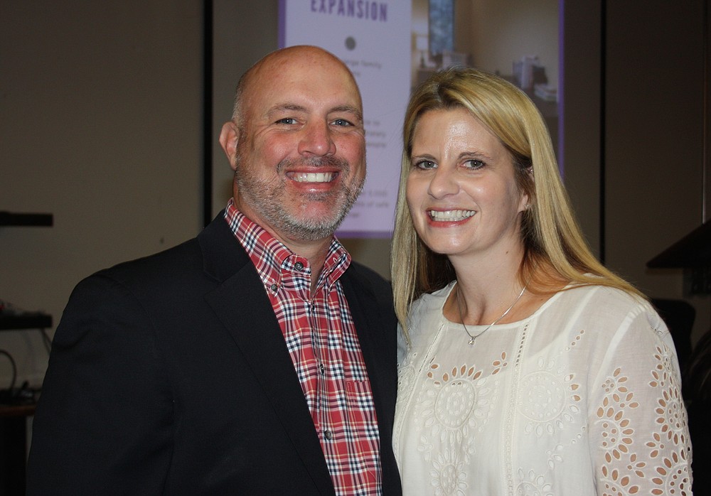 NWA Democrat-Gazette/CARIN SCHOPPMEYER Steve and Melissa Rogers, Courage Award honoree, enjoy the Peace at Home luncheon Oct. 20.