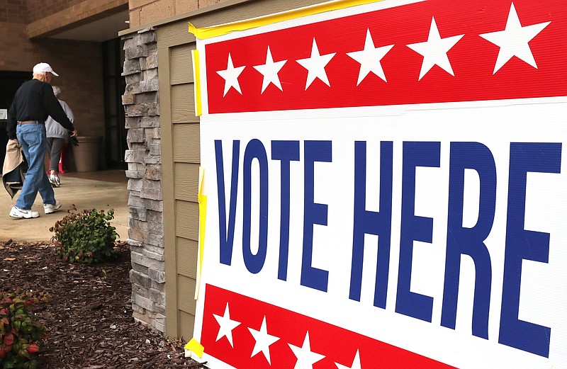 A “vote here” sign is displayed outside Hot Springs Mall in March 2020. The mall served as an early voting location in the 2020 primary. - File photo by The Sentinel-Record