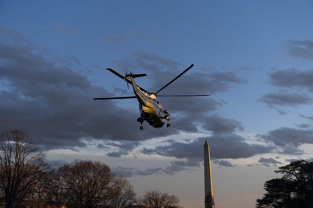 Marine One, with President Joe Biden aboard, lifts off from the South Lawn of the White House, Friday, Feb. 5, 2021, in Washington. (AP Photo/Alex Brandon)