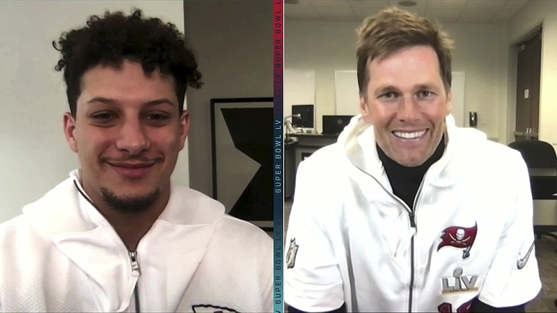 In this still image from video provided by the NFL, Kansas City Chiefs quarterback Patrick Mahomes, left, and Tampa Bay Buccaneers quarterback Tom Brady speak during Opening Night for the NFL Super Bowl 55 football game Monday, Feb. 1, 2021. (NFL via AP)